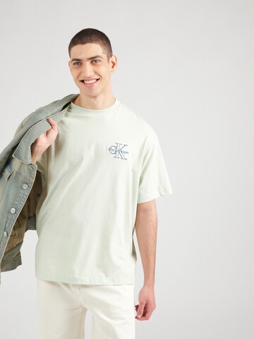 žalia Calvin Klein Jeans Marškinėliai: priekis