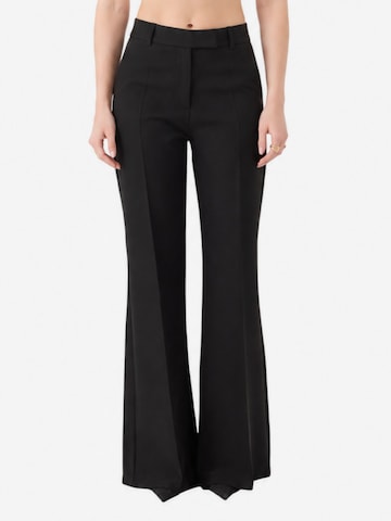 HOLLY LOLLY Trousers with creases in Black: front