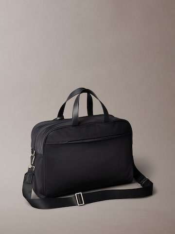 Sac d’ordinateur portable Calvin Klein en noir