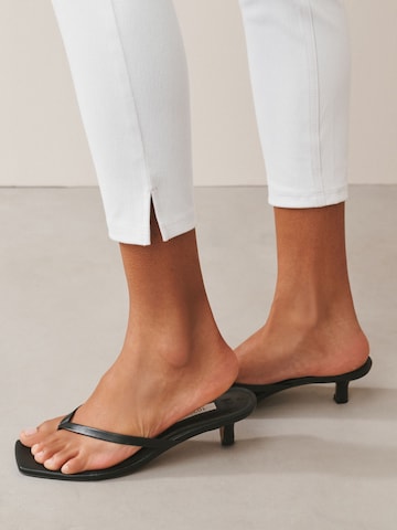 Skinny Leggings di Next in bianco