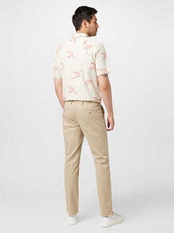 TOMMY HILFIGER Slim fit Chino trousers 'Denton' in Beige