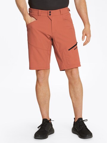 ZIENER Regular Workout Pants 'NELAT' in Orange: front