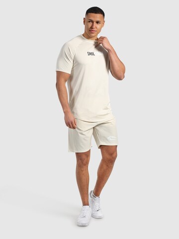 T-Shirt 'Powerfit Pro' Smilodox en blanc