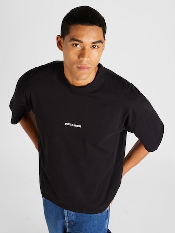 Pegador قميص بلون أسود: الأمام