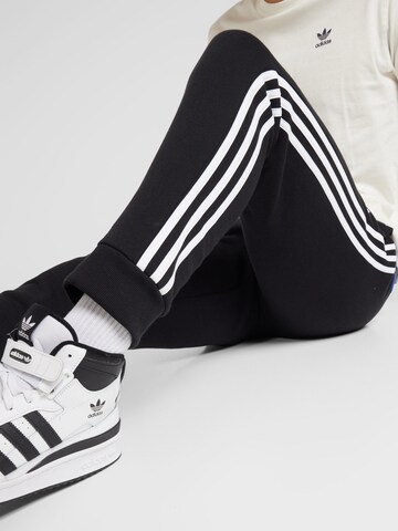 Tapered Pantaloni sport de la ADIDAS SPORTSWEAR pe negru