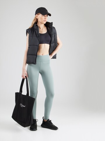 Skinny Pantalon de sport 'Fly Fast 3.0' UNDER ARMOUR en vert