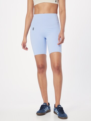 On Skinny Trousers in Blue: front
