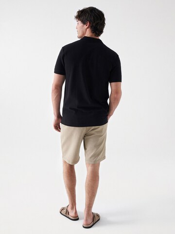 T-Shirt 'Markenaufdruck' Salsa Jeans en noir