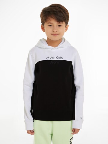 Calvin Klein Jeans - Sweatshirt em preto: frente