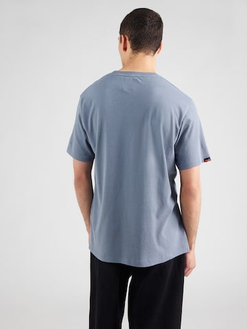 Superdry T-shirt 'ATHLETIC ESS' i blå