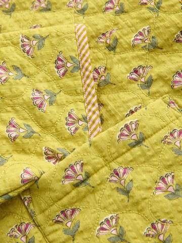 Next Přechodná bunda – žlutá