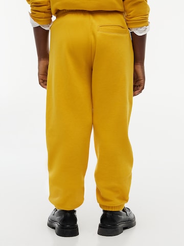 Effilé Pantalon TOMMY HILFIGER en jaune