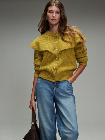 Next Плетена жилетка в жълто: отпред