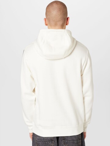 Sweat-shirt 'Repeat' Nike Sportswear en blanc