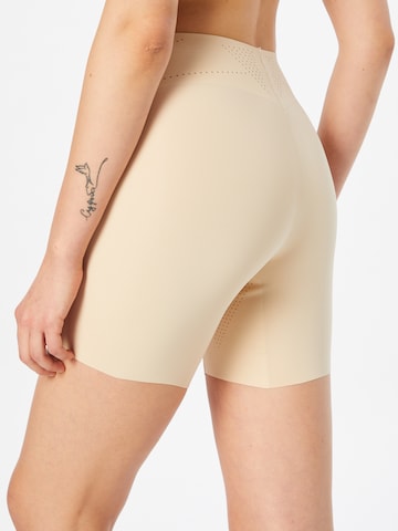 MAGIC Bodyfashion Muotoilevat housut värissä beige