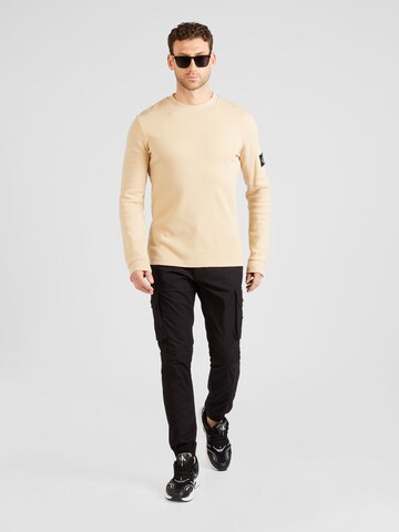 Calvin Klein Jeans Paita värissä beige