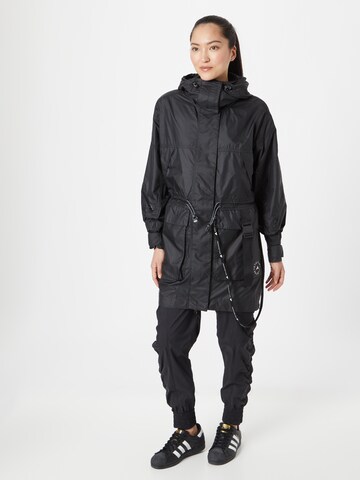 ADIDAS BY STELLA MCCARTNEY Outdoor Coat 'Transition' in Black: front