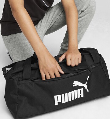 PUMA Sporttasche 'Phase' in Schwarz: predná strana