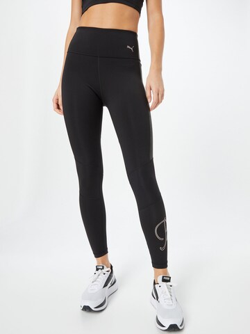 PUMA Skinny Workout Pants in Black: front