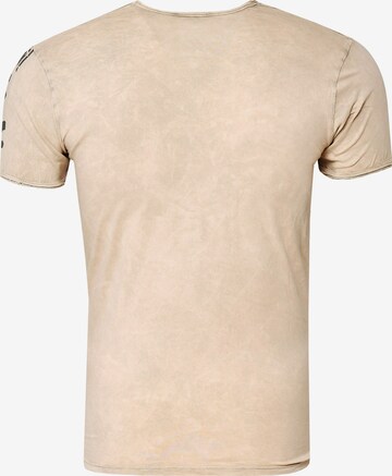 Rusty Neal T-Shirt mit zeitlosem Print in Beige