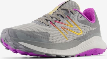 Chaussure de course 'Nitrel' new balance en gris : devant