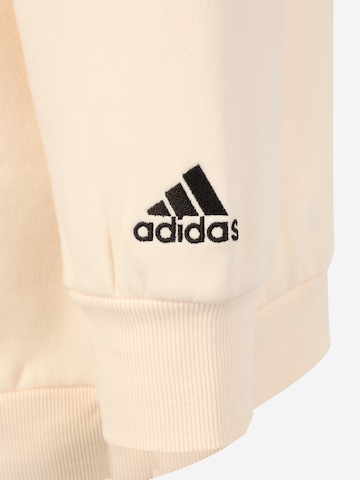 ADIDAS SPORTSWEAR Спортен суитшърт с качулка 'Essentials Fleece' в бежово