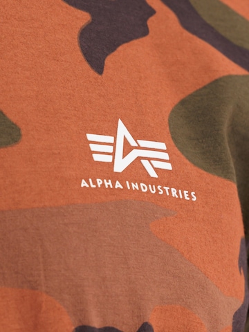 Coupe regular T-Shirt ALPHA INDUSTRIES en orange