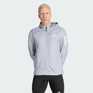 ADIDAS PERFORMANCE Sportjacke 'Own the Run' in Grau: predná strana