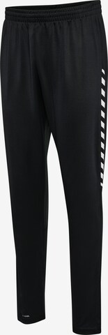 Hummel - Tapered Pantalón deportivo en negro