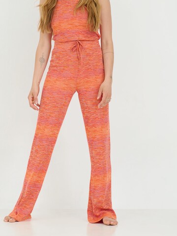 Loosefit Pantalon 'Lia' ABOUT YOU x Sofia Tsakiridou en orange : devant