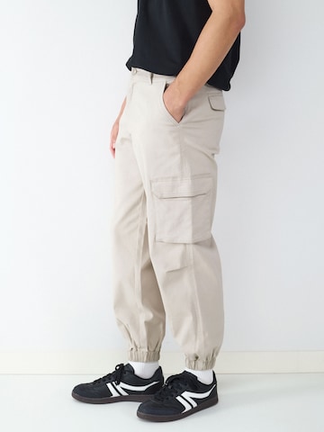 BALMOHK Tapered Gargohousut värissä beige