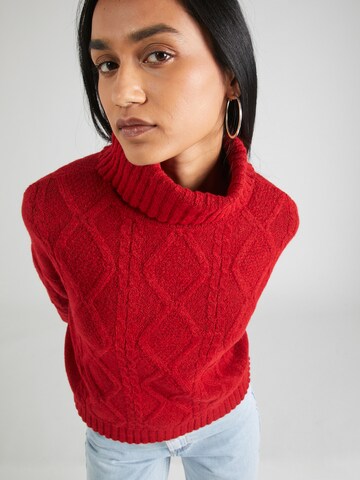 Pull-over 'Carla' ABOUT YOU en rouge