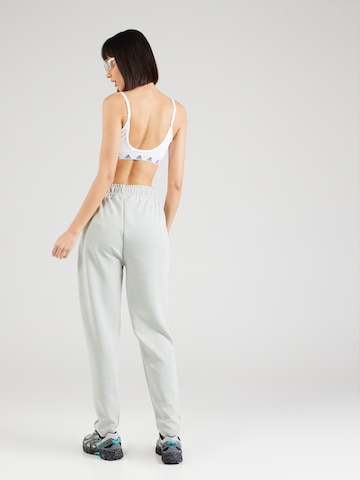 Athlecia - Tapered Pantalón deportivo 'Jillnana' en blanco