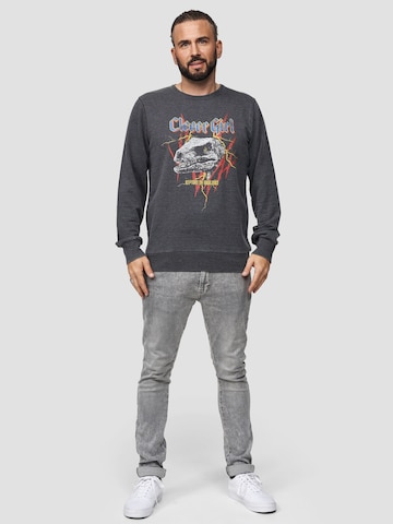 Sweat-shirt 'Jurassic Park T-Rex Rock' Recovered en gris