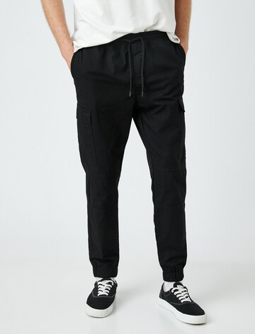 Koton Tapered Cargo trousers in Black: front