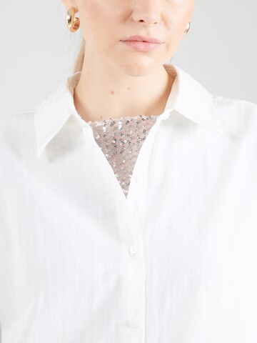NÜMPH - Blusa en blanco
