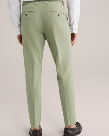 WE Fashion Конический (Tapered) Плиссированные брюки в Зеленый