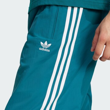 ADIDAS ORIGINALS Tapered Pants in Blue