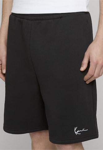 Karl Kani Regular Trousers in Black