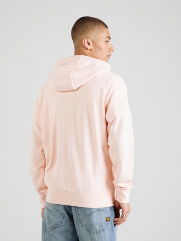 Nike Sportswear - Sudadera con cremallera 'CLUB' en naranja: atrás