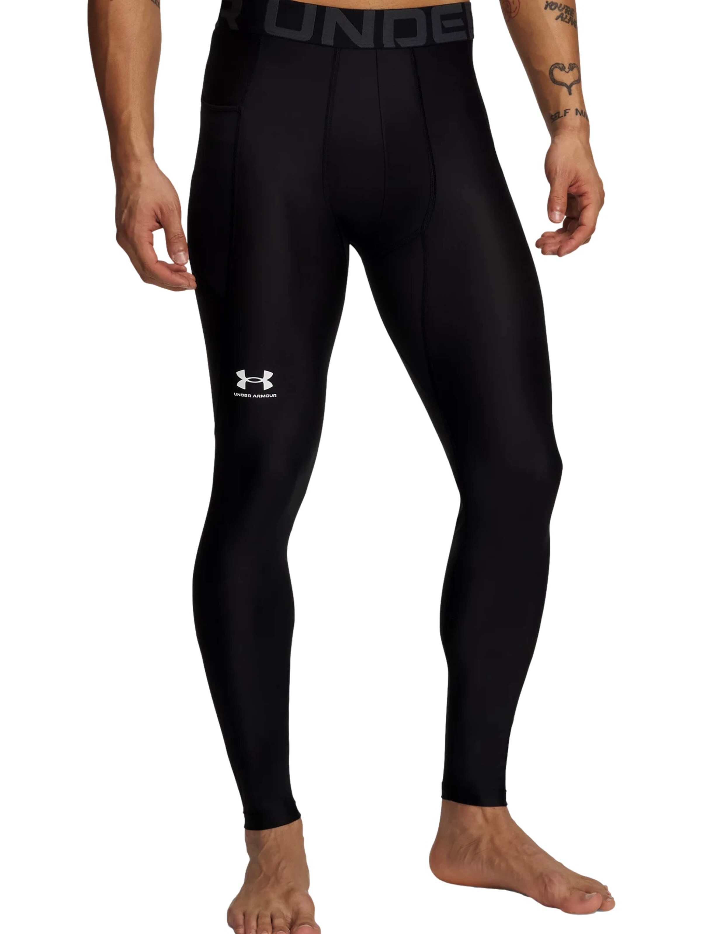 Skinny Pantalon de sport UNDER ARMOUR en noir : devant