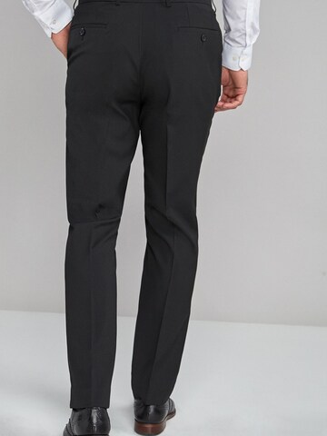 regular Pantaloni con piega frontale di Next in nero