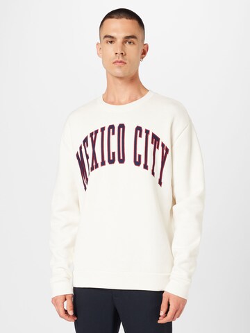 HOLLISTERSweater majica - bež boja: prednji dio