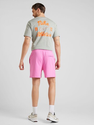 Nike Sportswear Loose fit Trousers 'CLUB' in Pink