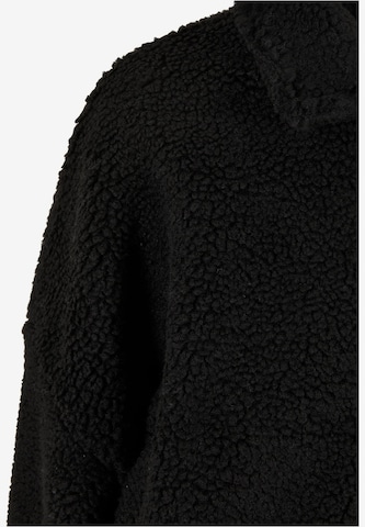 Jachetă  fleece de la Karl Kani pe negru