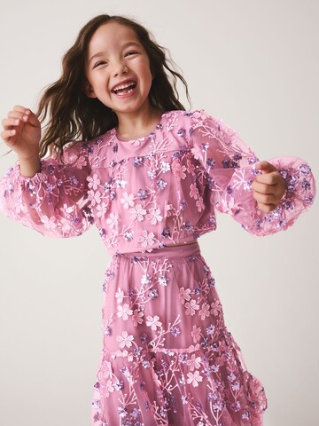 Set Next en rose