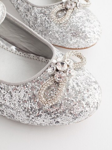 Next Flats in Silver