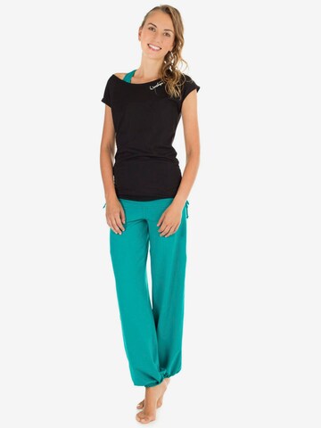 Winshape Tapered Sportbroek 'WH1' in Groen