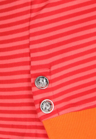 Pull-over swirly en rouge