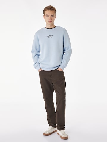 Koton Sweatshirt in Blauw: voorkant